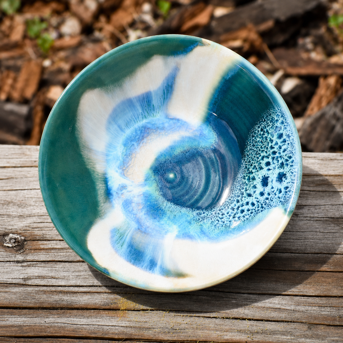 Turquoise and white flowing bowl
